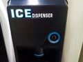 Ice dispenser machine with push for ice sign Royalty Free Stock Photo