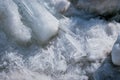Ice drift on the Amur River. Melting ice floes in spring. A heap of blocks and fragments. Sunny day. Royalty Free Stock Photo