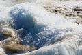 Ice drift on the Amur River. Melting ice floes in spring. A heap of blocks and fragments. Sunny day. Royalty Free Stock Photo