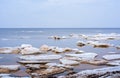Ice drift on Baltic sea. Spring cloudy day. Royalty Free Stock Photo