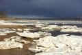 Ice drift on the river. End of winter. Huge white ice floes crack.Spring is coming. Royalty Free Stock Photo