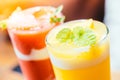 Ice drinking mango smoothie glass Royalty Free Stock Photo