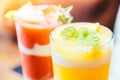 Ice drinking mango smoothie glass Royalty Free Stock Photo