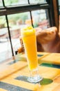 Ice drinking mango smoothie glass Royalty Free Stock Photo