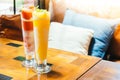 Ice drinking mango smoothie glass Royalty Free Stock Photo