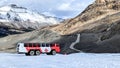 Ice Explorer, an all terrain vehicle with monster tires, on the Athabasca Glacier getting ready to depart the ice field. Royalty Free Stock Photo