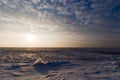 Ice field with setting sun