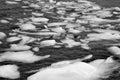 Black and white close up of icebergs, growlers in sea