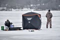 Ice Fishing Father and Son with Tent Royalty Free Stock Photo