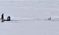 Ice fishermen check supplies