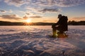 Ice fishing on a lake in Norway Royalty Free Stock Photo