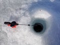 Ice fishing. Winter fishing, catching a fish in the North