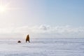 Ice Fishing. Winter fishing on ice at sea, Estonia.