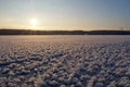 Ice flakes on the surface of a frozen river Royalty Free Stock Photo
