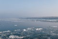 Ice floating in the river. Ice Break up Royalty Free Stock Photo