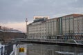 Ice floating in the Spree river with TV tower and Spree river background in Berlin Germany