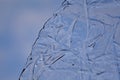 Ice floe with Grass strukture and blue sky Royalty Free Stock Photo