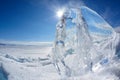 Ice floe and sun on winter Baikal lake Royalty Free Stock Photo