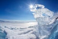 Ice floe and sun on winter Baikal lake Royalty Free Stock Photo