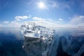 Ice floe and sun on winter Baikal lake Royalty Free Stock Photo