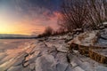 Ice floes on the lake shore. Colorful sky during sunrise on cold winter morning.Dam Liptovska Mara, Slovakia Royalty Free Stock Photo