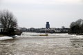 ice floes on the river Hollandsche IJssel at the town of Moordrecht in The Netherlands. Th ferry keeps on service between Gouderak