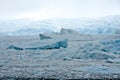 Ice flow and cracked ice with shelf ice of glacier in background, Antarctica Royalty Free Stock Photo