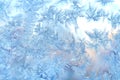 Ice flowers frozen blue window textured background Royalty Free Stock Photo