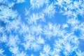 Ice flowers frozen blue window textured background Royalty Free Stock Photo