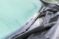 Ice flowers, frozen car window.The ice-cold frost forms ice crystals in beautiful unique patterns on the window, Hood and wiper o Royalty Free Stock Photo