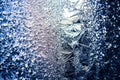 Ice flowers frozen on window. Winter cold textured pattern. Macro view. Frost crystal Royalty Free Stock Photo