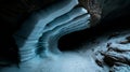 Ice formations in cave with layers and textures showcasing nature\'s frozen beauty Royalty Free Stock Photo