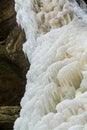 Ice formations on the frozen falls. Royalty Free Stock Photo