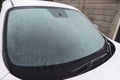 Ice formed on car windscreen in freezing weather Royalty Free Stock Photo