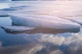 Ice on frozen lake, Jokulsarlon Iceland with sky reflection