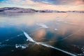 Ice on the frozen lake at sunset Royalty Free Stock Photo