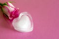 Ice heart on pink abstract valentine love background