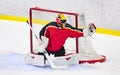 Ice Hockey - Goalie catches the puck Royalty Free Stock Photo