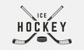 Ice Hockey logo, poster. Vintage hockey emblem with crossed hockey cues Royalty Free Stock Photo