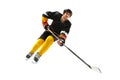 Ice hockey player in action isolated on white. Royalty Free Stock Photo