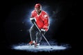 Ice hockey player isolated on black background Royalty Free Stock Photo