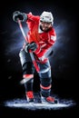 Ice hockey player isolated on black background Royalty Free Stock Photo