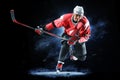 Ice hockey player isolated on black background Royalty Free Stock Photo