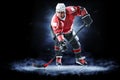 Ice hockey player isolated on black background Royalty Free Stock Photo