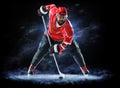 Ice hockey player isolated on black background Royalty Free Stock Photo