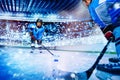 Ice hockey player passing the puck to teammate Royalty Free Stock Photo