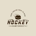 ice hockey puck logo vintage vector illustration template icon graphic design. winter sport club sign or symbol for tournament or Royalty Free Stock Photo