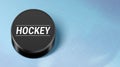 Ice hockey realistic vector background, with rubber puck on a scratched blue rink