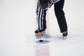 Ice Hockey referee a puck in your hand Royalty Free Stock Photo