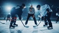 Ice Hockey Rink Arena Game Start: Two Players Brutal Face off, Sticks Ready, Referee is Going to Royalty Free Stock Photo